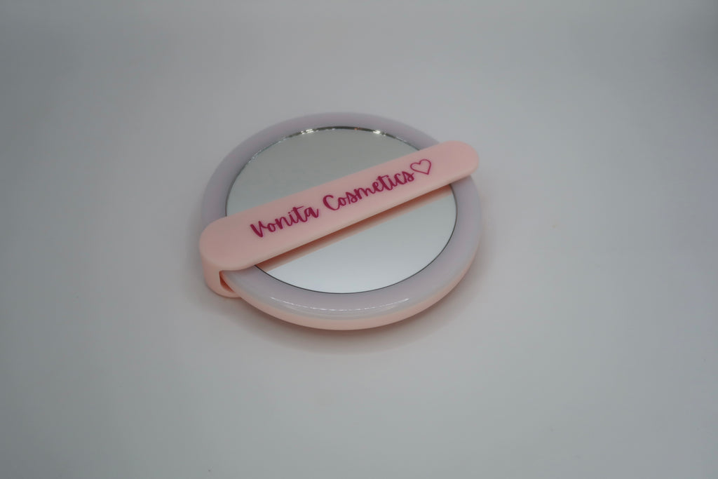 Pink rechargeable  hand held mirror