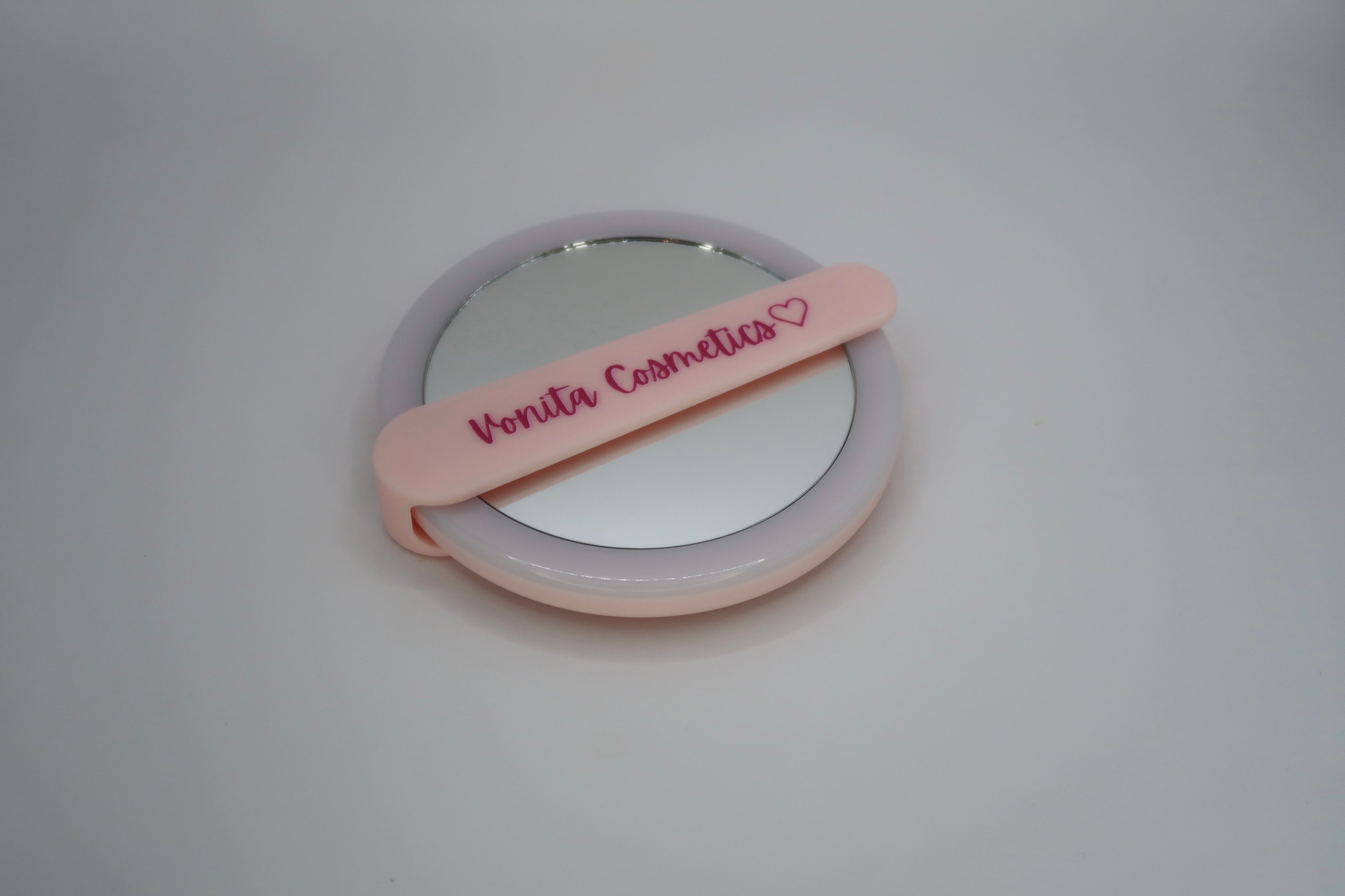 Pink rechargeable  hand held mirror