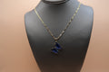 Blue diamond butterfly necklace