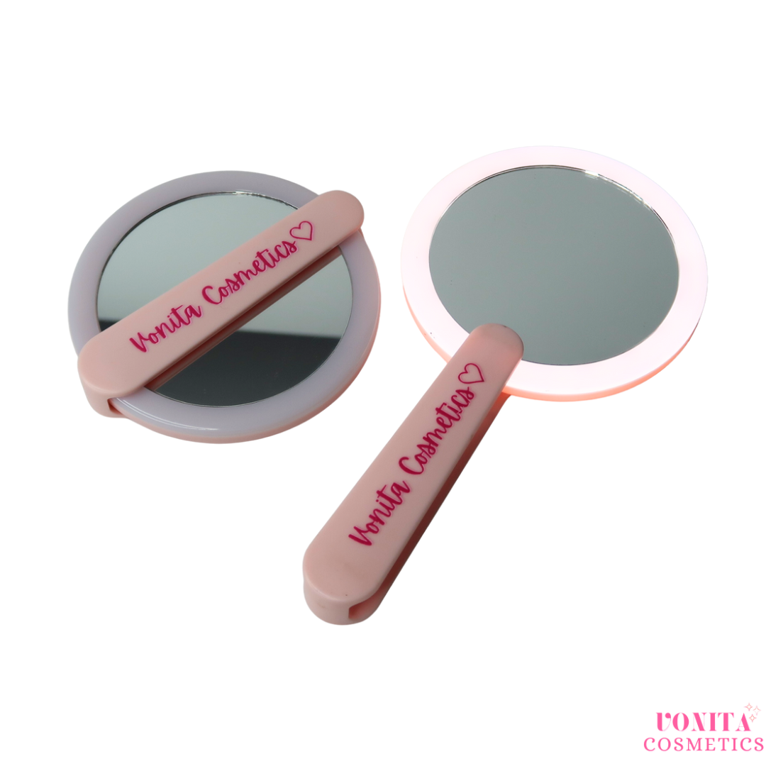Pink rechargeable  hand held mirror