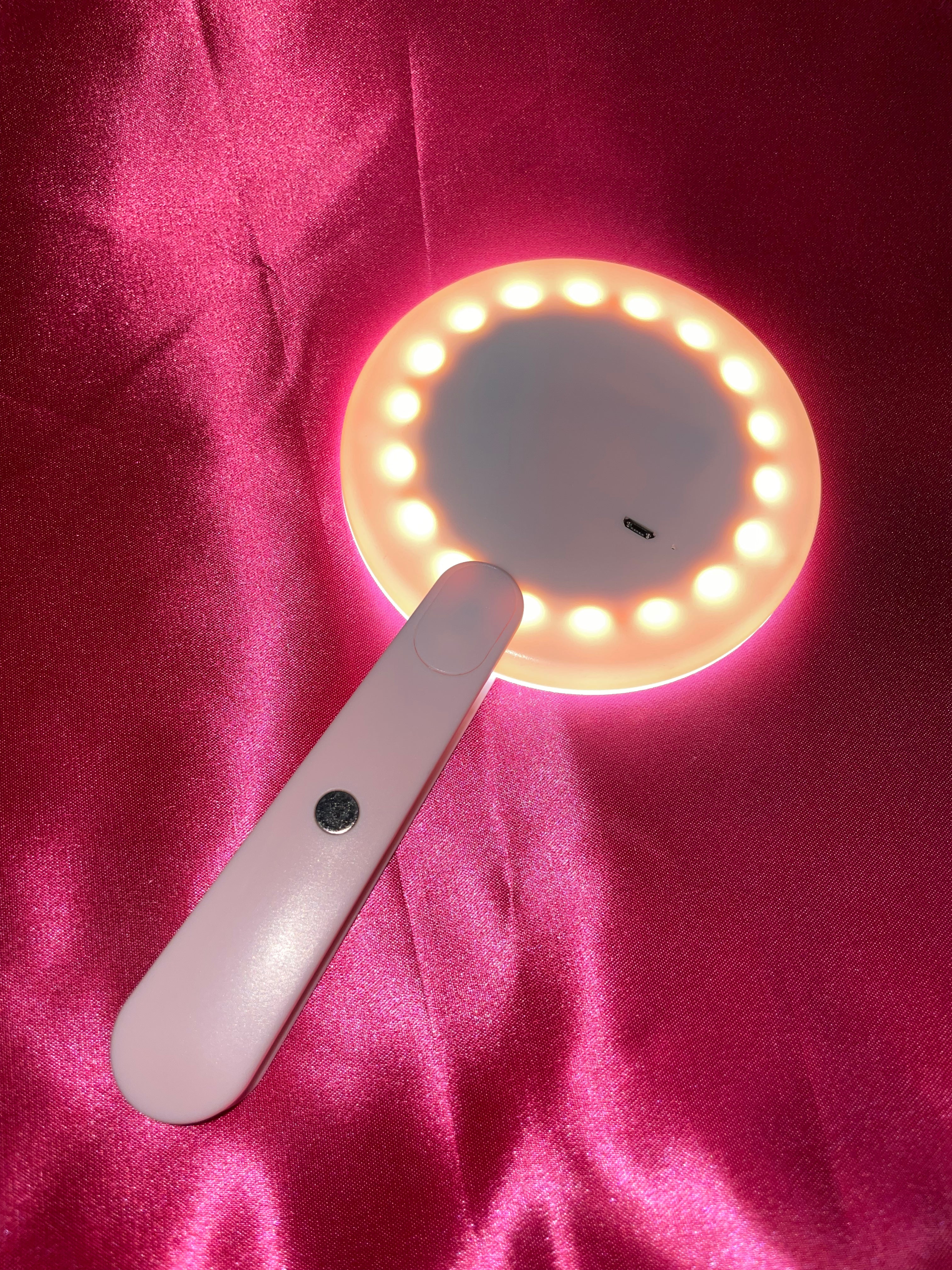 Pink rechargeable  hand held mirror